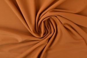 Lycra 44 donker okergeel