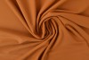 Lycra 44 donker okergeel