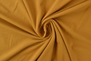 Katoen jersey 44 donker okergeel